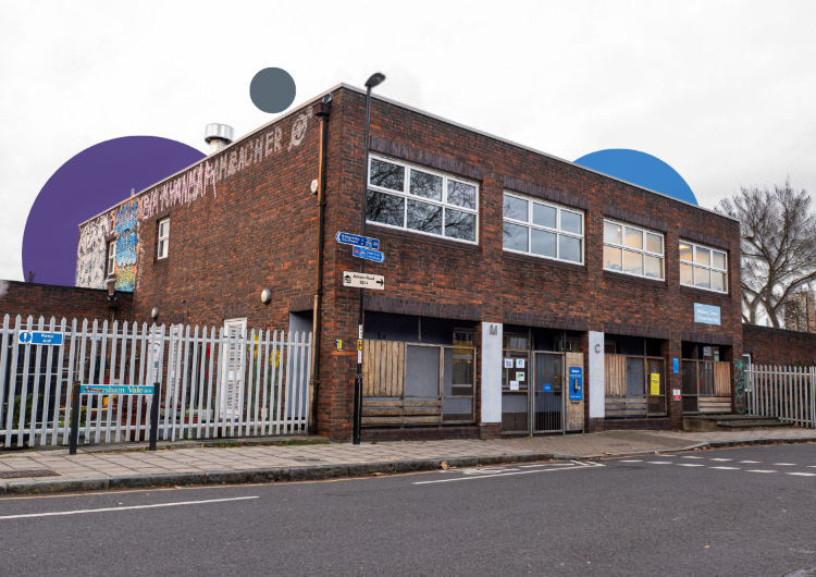 Exterior view of METRO's brick community building in New Cross, showing an accessible street entrance.